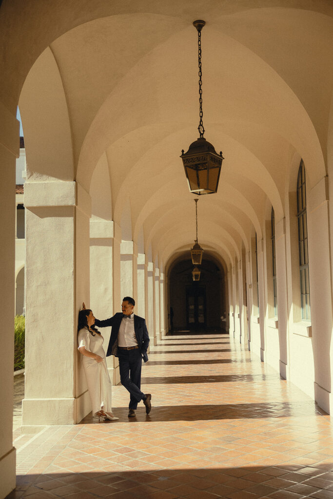 Far away shot of a couple posing for their elopement portraits.