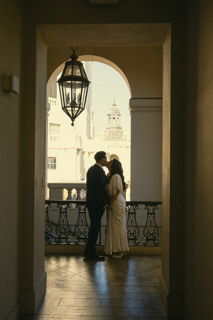 Couple kissing during their Pasadena City Hall elopement.