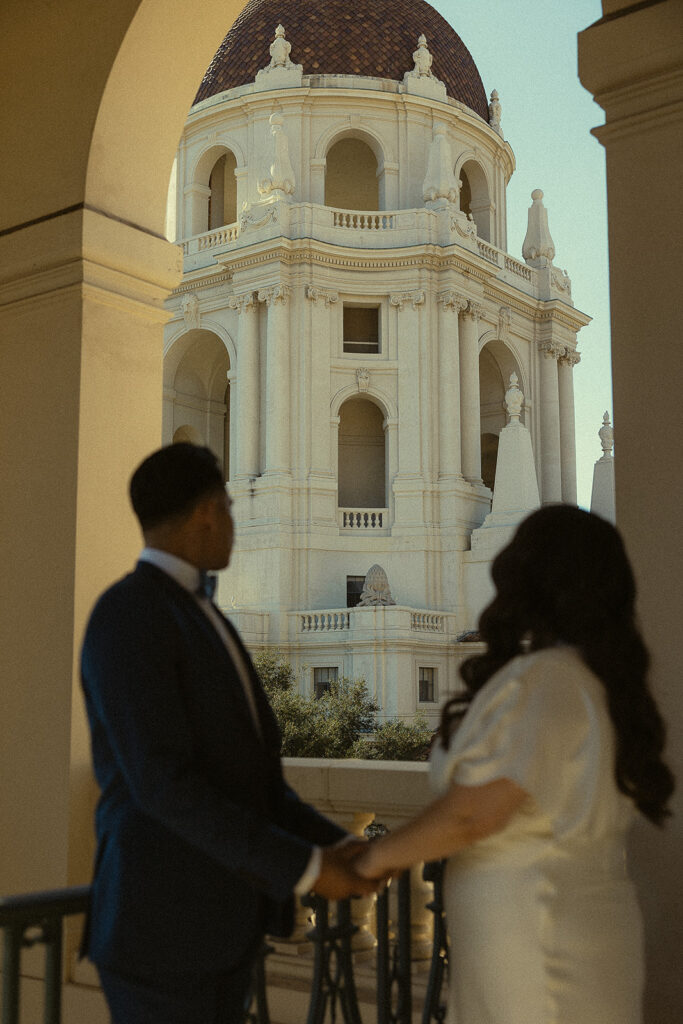 Couple admiring the Rotunda at the Pasadena City Hall.