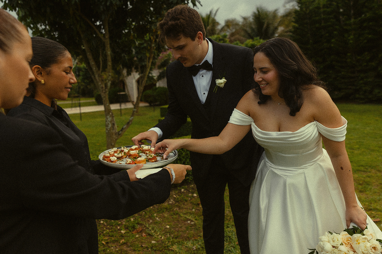 Bride and groom getting passed 