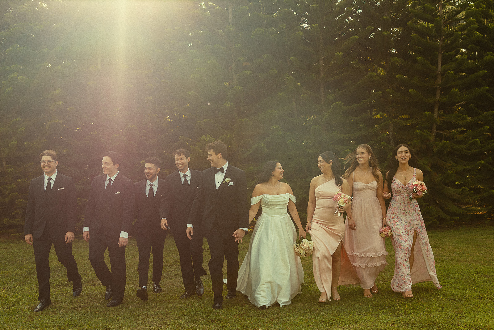 Outdoor golden hour wedding party portraits at Cinco Farm Gardens in Miami, Florida. 