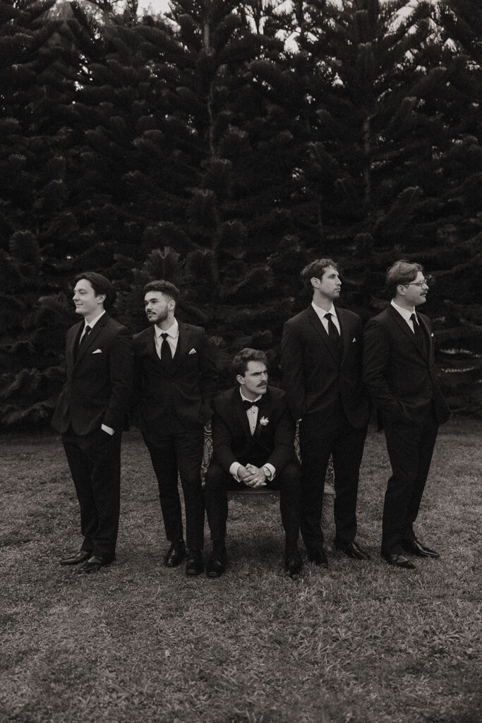 Groom and groomsmen portraits at Cinco Farm Gardens.