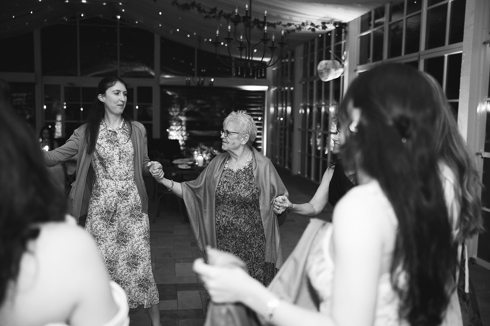 Guests dancing during wedding reception at Cinco Farm Gardens.