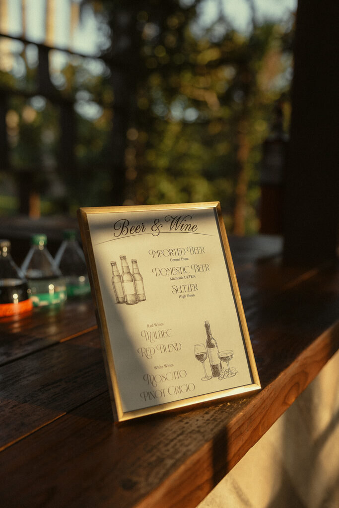 Beer and wine menu sign at Cinco Farm Gardens wedding reception.