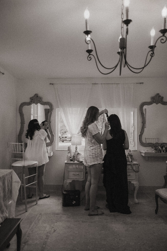 Bride and bridesmaids getting ready before a Florida wedding.