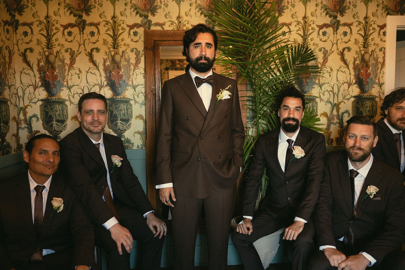 Groom and groomsmen photos inside the grooms suite at Jeune Perché.